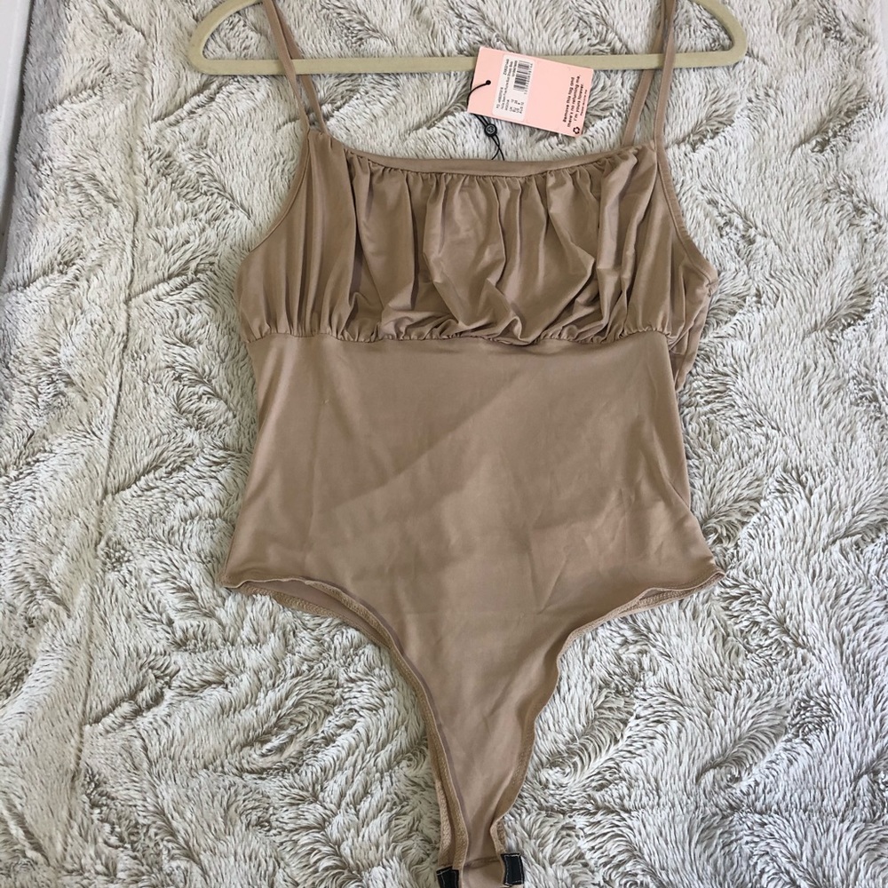 Nude body suit